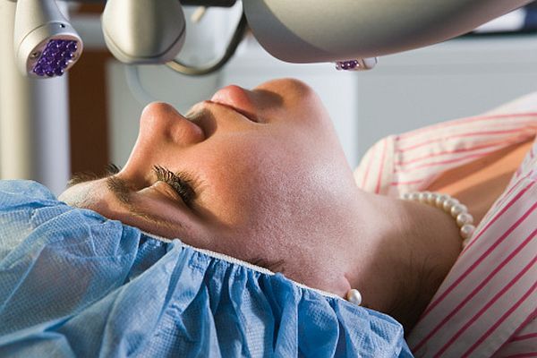eye patient undergoing eye examination before strabismus surgery in iran
