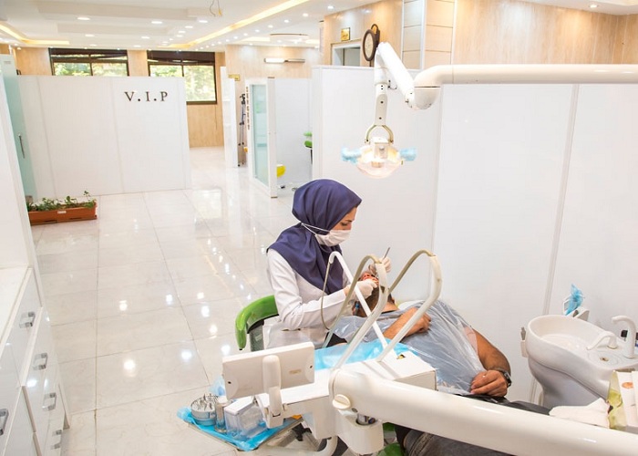 female iranian dentist in a clean and modern dental clinic in iran